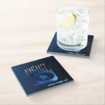 Shiny Blue Chanukkah Menorah Glass Coaster<br><div class="desc">A modernistic,  metallic,  blue Chanukkah menorah,  featuring a lion in silhouette,  against a dark,  night-like background. All nine of the candles are lit. Hebrew text reading "Chag Chanukkah Sameach" (Happy Hanukkah) also appears in glowing blue and white.</div>