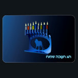 Shiny Blue Chanukkah Menorah Magnet<br><div class="desc">A modernistic,  metallic,  blue Chanukkah menorah,  featuring a lion in silhouette,  against a dark,  night-like background. All nine of the candles are lit. Hebrew text reading "Chag Chanukkah Sameach" (Happy Hanukkah) also appears in glowing blue and white.</div>