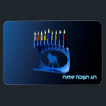 Shiny Blue Chanukkah Menorah Magnet<br><div class="desc">A modernistic,  metallic,  blue Chanukkah menorah,  featuring a lion in silhouette,  against a dark,  night-like background. All nine of the candles are lit. Hebrew text reading "Chag Chanukkah Sameach" (Happy Hanukkah) also appears in glowing blue and white.</div>