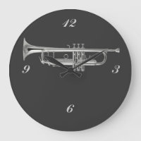 Shiny silver trumpet on charcoal background
