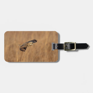 Short-eared owl in flight at the grasslands luggage tag