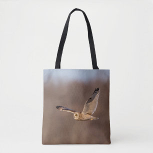 Short-eared owl in flight tote bag
