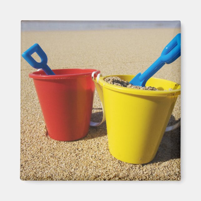 Shovels And Pails On Sandy Beach Magnet (Front)