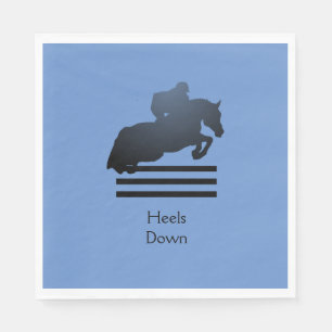 Show jumper clearing an obstacle. Napkin