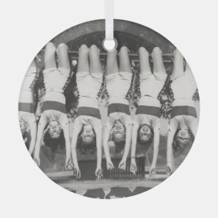 Showgirls on monkey bars, playful design. glass tree decoration