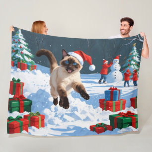 Siamese Cat Running in Snow with Christmas Hat Fleece Blanket