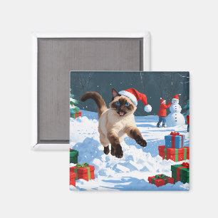 Siamese Cat Running in Snow with Christmas Hat Magnet