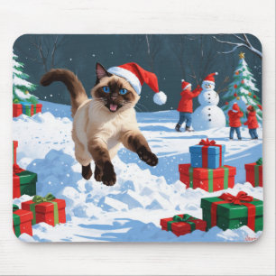 Siamese Cat Running in Snow with Christmas Hat Mouse Pad
