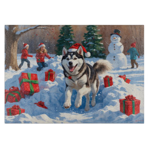 Siberian Husky Running in Snow with Christmas Hat Cutting Board