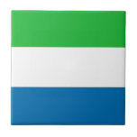 Sierra Leone Flag Ceramic Tile<br><div class="desc">This design consists of the Sierra Leonean flag cleverly reshaped to fit the square tile surface. A decorative and useful item that would make a perfect gift for those who like to remember Sierra Leone.</div>
