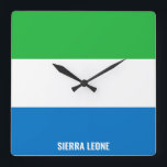 Sierra Leone Flag Dazzling Patriotic Square Wall Clock<br><div class="desc">Sierra Leone Flag Dazzling Patriotic Square Wall Clock in the colours and the elements of the Sierra Leone national flag covering the front of the clock. National flag colours are complemented with the text "Sierra Leone" on the bottom. Text is fully customisable using "Customise it!" feature. Feel free to change...</div>