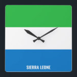 Sierra Leone Flag Dazzling Patriotic Square Wall Clock<br><div class="desc">Sierra Leone Flag Dazzling Patriotic Square Wall Clock in the colours and the elements of the Sierra Leone national flag covering the front of the clock. National flag colours are complemented with the text "Sierra Leone" on the bottom. Text is fully customisable using "Customise it!" feature. Feel free to change...</div>