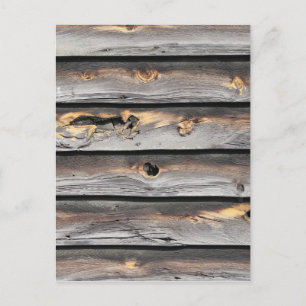 signed by the weather as old wood background postcard