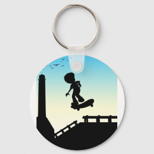 Silhouette boy skateboarding on the street key ring