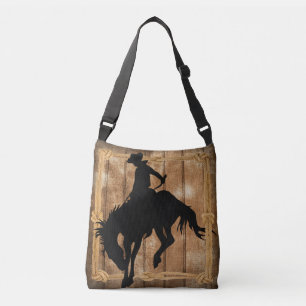 Silhouette Cowboy on a Bucking Bronco Horse Crossbody Bag