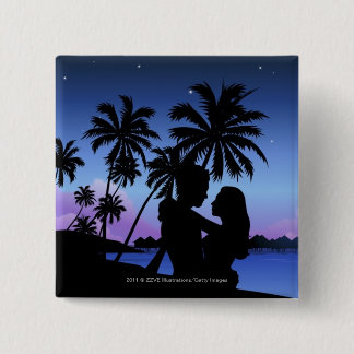 Silhouette of a couple embracing on the beach 15 cm square badge