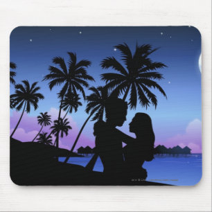 Silhouette of a couple embracing on the beach mouse pad