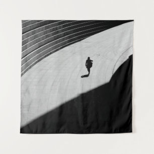 SILHOUETTE OF A PERSON WALKING ON GRAY CONCRETE FL TAPESTRY