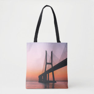 SILHOUETTE OF BRIDGE UNDER CLEAR SKY TOTE BAG
