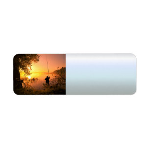 Silhouette of Fisherman on Lake at Sunset
