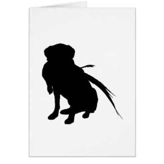 Silhouette of Labrador Retriever with pheasant