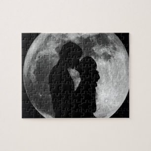 Silhouette of lovers in a full moon at night jigsaw puzzle