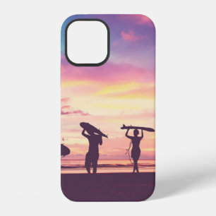 Silhouette Of surfer people carrying their surfboa iPhone 12 Case