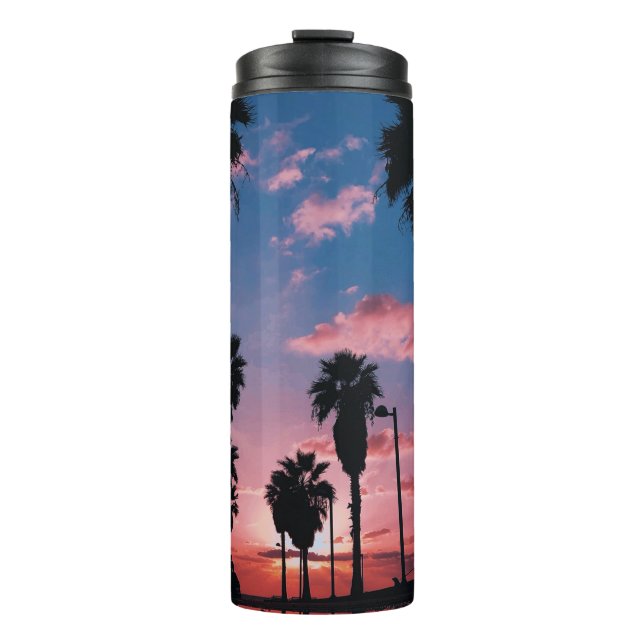 Silhouette of tree under cloudy sky thermal tumbler (Front)