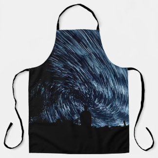 Silhouette photo of person standing apron
