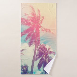 Silhouette tropical palm tree with sun light on su bath towel