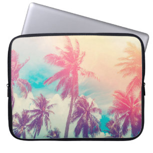 Silhouette tropical palm tree with sun light on su laptop sleeve