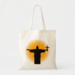 Silhouette with a cross tote bag