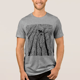Silhouetted Ravens in the Winter Trees Tri-Blend Shirt