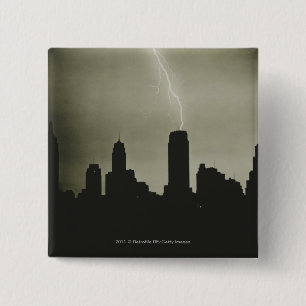 Silhouettes of skyscrapers and lightning in sky 15 cm square badge