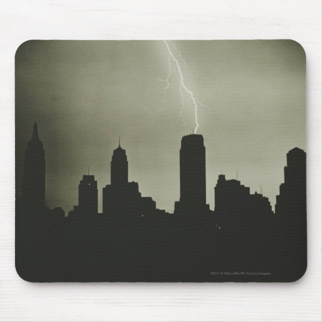 Silhouettes of skyscrapers and lightning in sky mouse pad (Front)