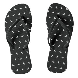 Silhouettes of Small White Bananas on Black Jandals