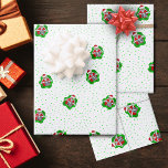 Silly Christmas Skeleton in Splatter Shape Green Wrapping Paper Sheet<br><div class="desc">This set of wrapping paper sheets have a repeated image of a silly skeleton wearing a red Santa Claus hat holding ornaments up to his eyes inside a bright red and green splatter shape on a white background with green polka dots.</div>