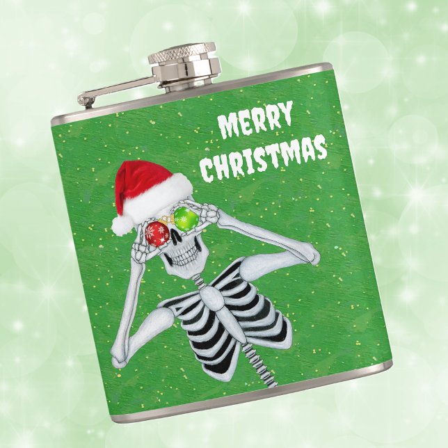 Silly Christmas Skeleton Ornament Eyes Green Gold Hip Flask (Silly Merry Christmas skeleton ornament eyes Santa hat on green with gold flecks hip drinking flask.)