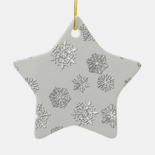 Silver 3-d snowflakes on a silver background ceramic tree decoration