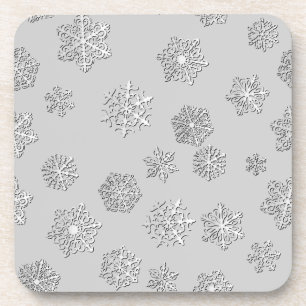 Silver 3-d snowflakes on a silver background coaster