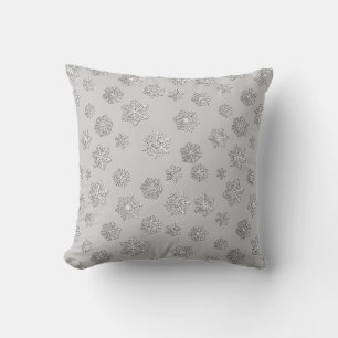 Silver 3-d snowflakes on a silver grey background cushion