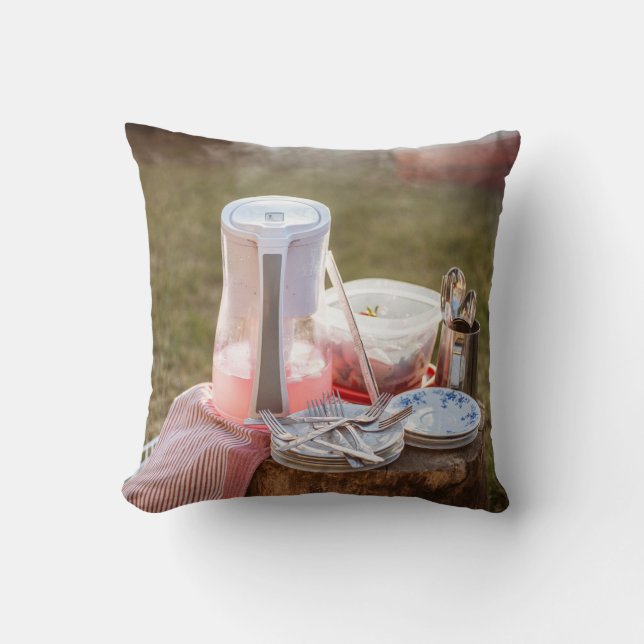 Silver-and-blue floral ceramic plates and pitcher cushion (Front)