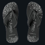 Silver & Black Elegant Maid of Honour Wedding Jandals<br><div class="desc">These beautiful wedding flip flops are a great way to thank and recognise your Maid of Honour while saving her feet at the same time. Features an elegant design with ornate silver grey curls and swirls on a black background and fancy script lettering. The test reads Maid of Honour with...</div>