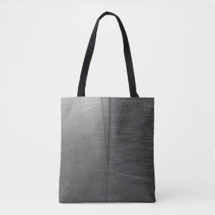 Silver chain link on grey textile tote bag