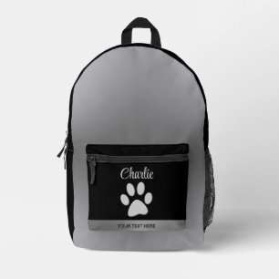 Silver Dog Paw on black background Printed Backpack