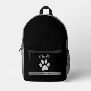 Silver Dog Paw on black background Printed Backpack