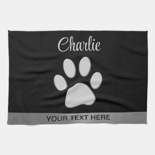Silver Dog Paw on black background Tea Towel
