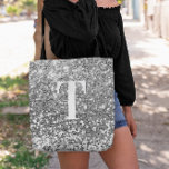 Silver Faux Glitter Bokeh Sparkles Monogram Tote Bag<br><div class="desc">A modern bold single letter monogram in white with a black drop shadow. The font size, colour and style are customisable. The background is a faux silver grey glitter with sparkly spots or bokeh. Move or delete the tiny faux sparkle graphic images. Silvery grey gift for a bridesmaid or other...</div>