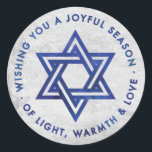 Silver Foil Hanukkah Greeting Sticker<br><div class="desc">Sticker with a silver foil effect backgroung,  with the Star of David and the Hanukkah greeting,  "Wishing you a joyful season of light,  warmth and love" in a dark blue watercolor effect. Perfect for using as favour stickers on gelt bags.</div>
