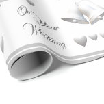 Silver Hearts & Bells Wedding Wrapping Paper<br><div class="desc">Gorgeous Silver Hearts & Bells Wedding wrapping paper design features the image of silver wedding bells and ribbons with silver hearts patterned against a white background. Customisable text reads, "On Your Wedding" and is displayed in an elegant silver font. A silver and white lining is featured at edges of design....</div>